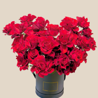 Classic black box overflowing with red roses elegant Valentine’s flower delivery in Lebanon.