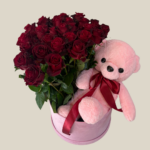 Pink teddy bear with red roses in pink velvet box – Valentine’s Day flower delivery to Lebanon.